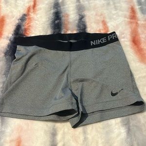 Gray nike pro shirts size Girls Youth Large (fits like a adult small)